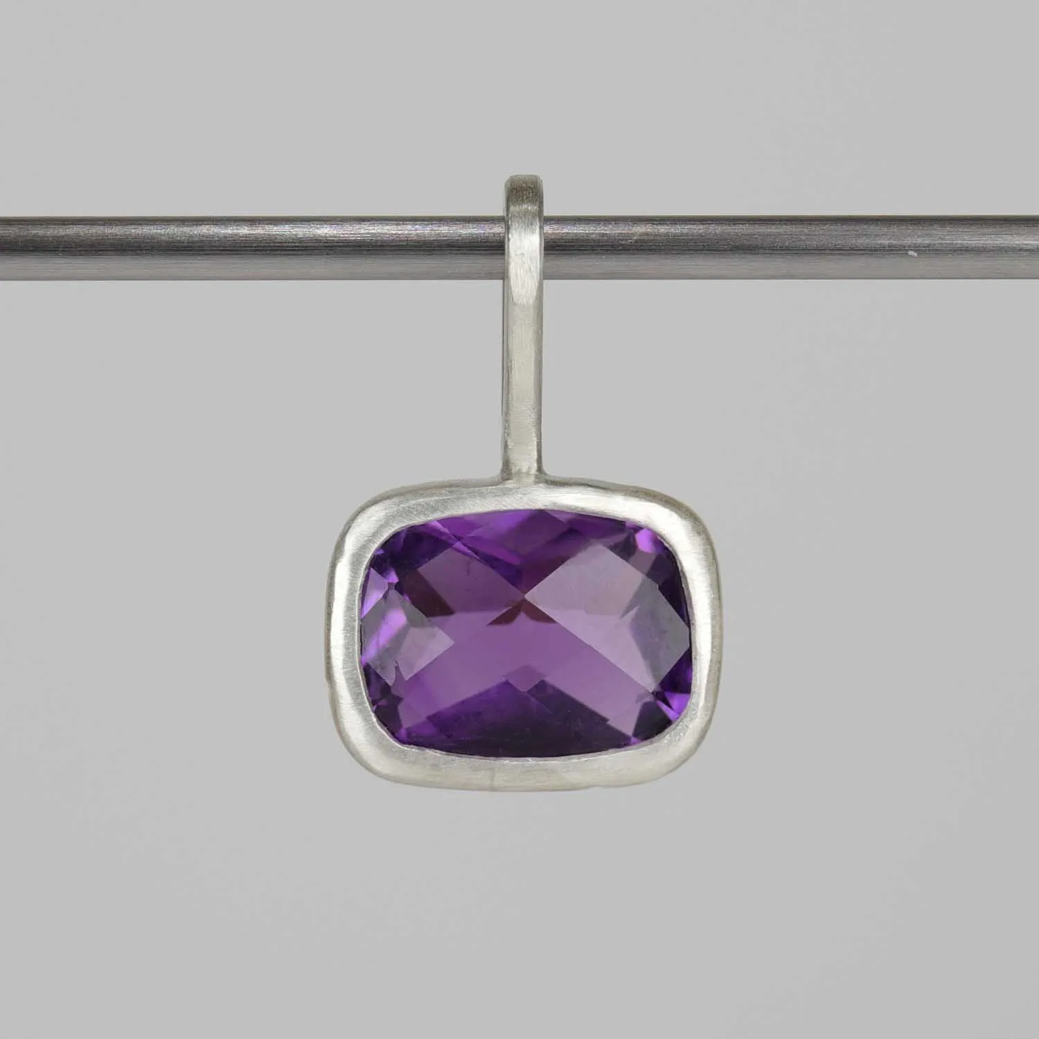 . Bezel-set Amethyst Charm in Silver